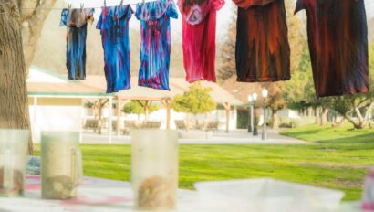 Tie dye shirts hanging to dry.