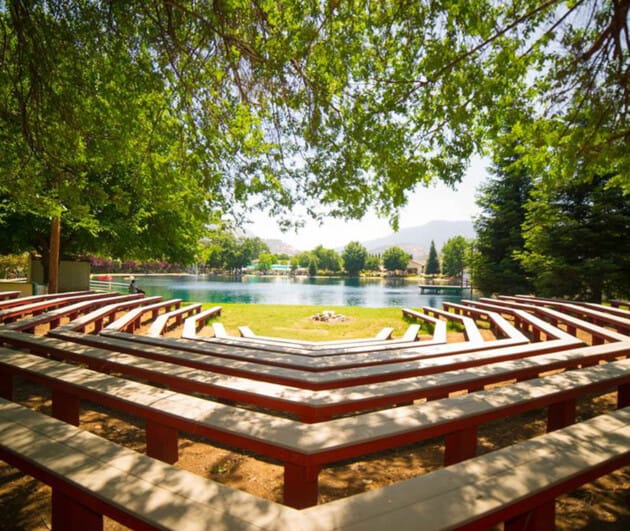 Outdoor campfire space with benches.