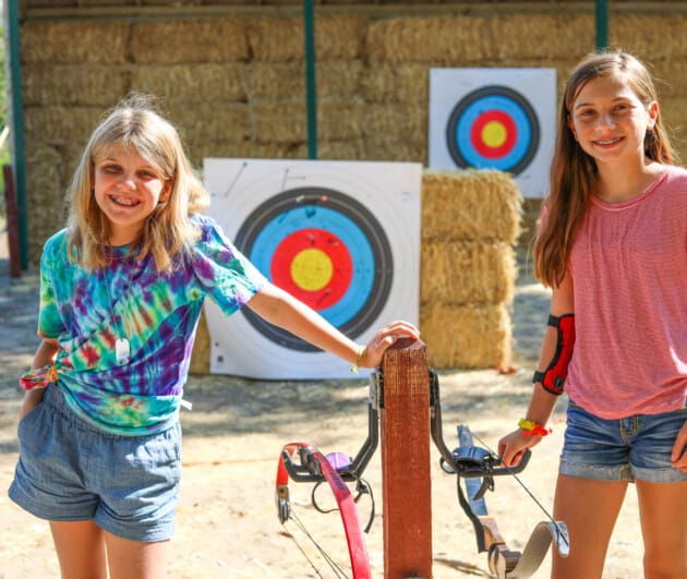 Two campers at archery.