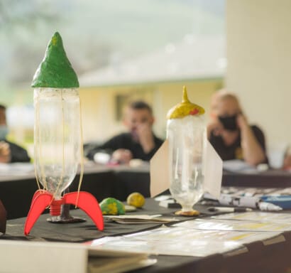 Campers making bottle rockets.