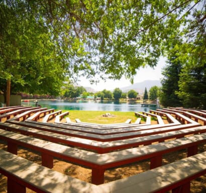 Outdoor campfire space with benches.